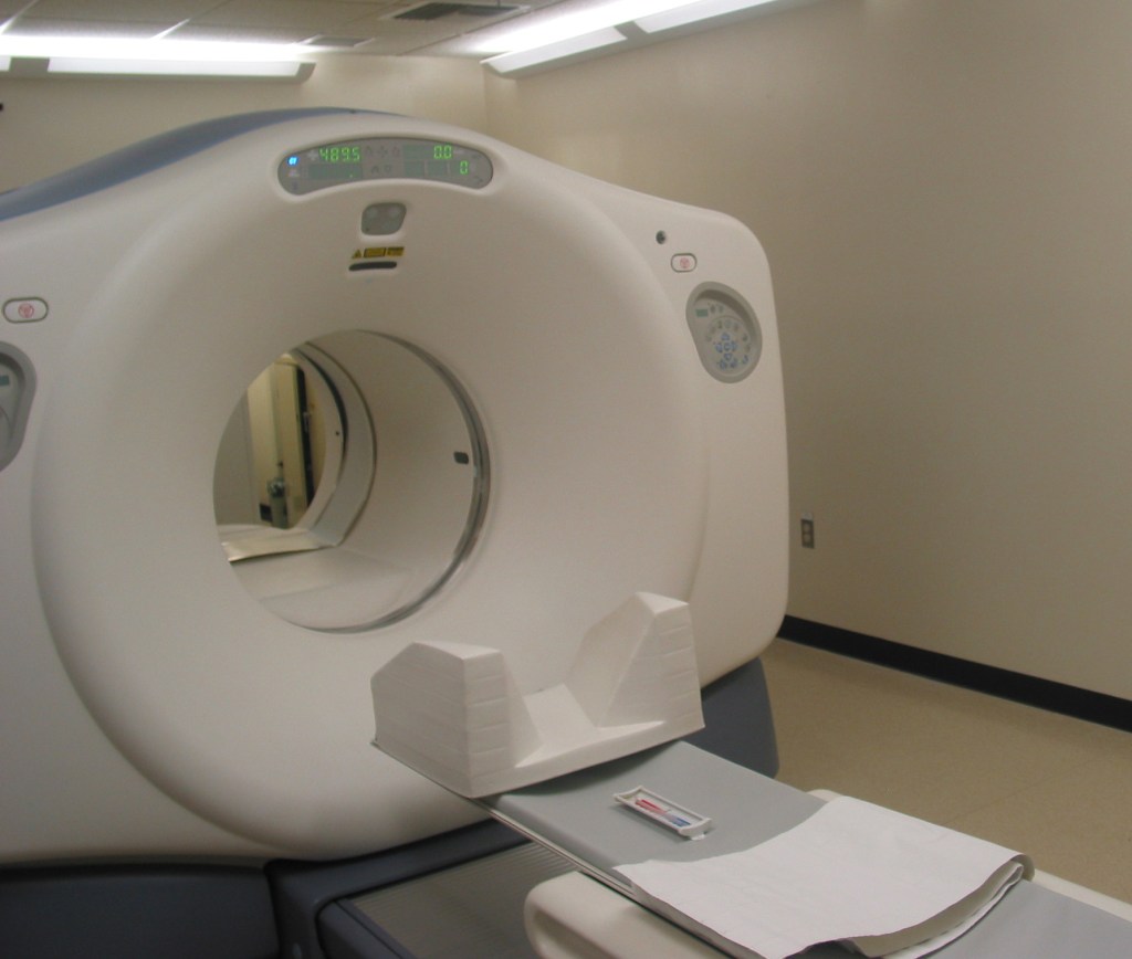 A magnetic resonance imaging scanner and its patient table.